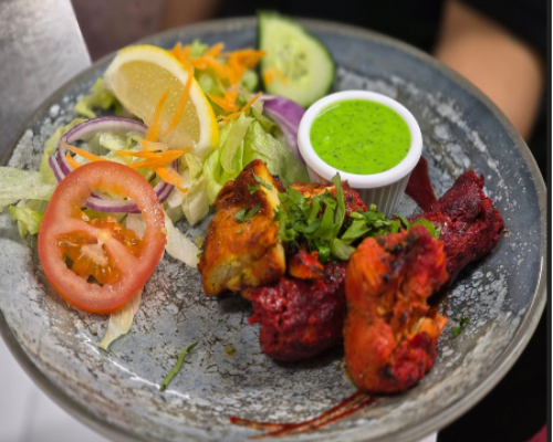 Tandoori Chickens with Sauce and Salad Served at Gurkha Country Bar & Grill Worcester